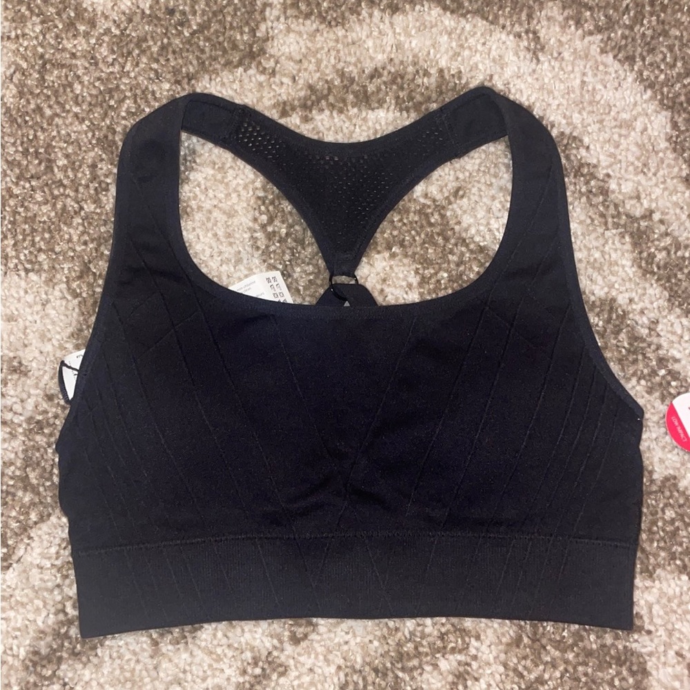 Flexible sports bra. Small. Never worn!